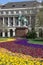 Budapest, colorful flowerbed and equestrian statue