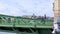 Budapest Hungary 03 16 2019 tourists take photos on the Freedom Bridge in Budapest background of Buda Castle