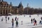 Budapest, Hungary - 20/02/2018: famous ice skating rink with people. Frozen lake with skaters. Winter activity and fun concept.