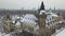 Budapest, Hungary - 4K aerial footage of drone taking of at Vajdahunyad Castle in the snowy City Park