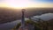 Budapest, Hungary - 4K flying away of Statue of Liberty on Gellert Hill with Liberty Bridge at background