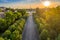 Budapest, Hungary - Aerial drone view of Andrassy street at sunrise with Heroes` Square Hosok tere at background