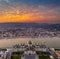 Budapest, Hungary - Aerial panoramic drone view of the Parliament of Hungary at sunset with beautiful dramatic golden clouds