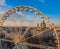 Budapest, Hungary - Aerial view of the ferris wheel at Elisabeth Square Erzsebet ter at sunset with St. Stephen`s Basilica