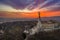 Budapest, Hungary - Aerial view of the Hungarian Statue of Liberty with Buda Hills and amazing colorful sunset behind