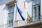 BUDAPEST, HUNGARY - APRIL 2020 : Hungarian flags on the Hungarian Presidential Sandor Palace of Budapest