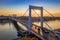 Budapest, Hungary - Beautiful Elisabeth Bridge Erzsebet hid at sunrise with golden and blue sky, heavy morning traffic