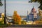 Budapest, Hungary - Bench and autumn foliage on the Buda hill with the Hungarian Parliament