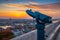 Budapest, Hungary - Blue binoculars with the view of Pest with St. Stephen`s Basilica, Szechenyi Chain Bridge