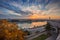 Budapest, Hungary - Colorful autumn trees at Buda Castle with skyline view of Budapest at sunrise