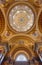 Budapest, Hungary - Feb 8, 2020: Luxarily decorated golden ceiling with cupola in St. Stephen`s Basilica