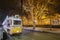 Budapest, Hungary - Festively decorated light tram Fenyvillamos on the move with Parliament of Hungary