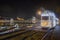 Budapest, Hungary - Festively decorated light tram fenyvillamos on the move with Szechenyi Chain Bridge, Matthias Church