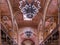 BUDAPEST, HUNGARY- MAY, 26, 2019: ceiling and chandelier inside the nave of the great synagogue in budapest