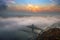 Budapest, Hungary - Mysterious foggy sunrise with Liberty Bridge Szabadsag hid and hazy skyline of Budapest