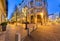 Budapest, Hungary - November 30, 2019: Twilight street view on Dorottya utca with people walking on the street