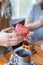 Budapest, Hungary - October 19, 2109: Traditional home-made gingerbread baking. Assembling and decorating gingerbread house