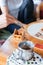 Budapest, Hungary - October 19, 2109: Traditional home-made gingerbread baking. Assembling and decorating gingerbread house