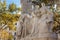 Budapest, Hungary. October 2019: Close-up Statue of Mihaly Vorosmarty and people walking near on the Vorosmarty square