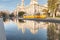 BUDAPEST, HUNGARY - OCTOBER 27, 2015: Budapest Parlament Square with Fountain water, tram and reflection. Museum of Ethnography