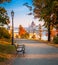 Budapest, Hungary - Romantic sunrise scene at Buda district with bench, lamp post, autumn foliage