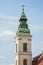 Budapest Inner City Parish Church or Church of the Blessed Virgin Mary tower, Hungary, Europe. White tower with green or blue roof