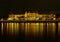 Budapest night view along the Danube with attractively lit institutional building