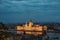 Budapest parliament night yellow illumination river bank