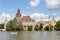 Budapest Vajdahunyad Castle with people with blurred faces in boats