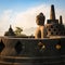 Buddha in Borobudur Temple at sunrise. Indonesia.