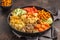 Buddha bowl with vegetables, mushrooms, bulgur, hummus and baked