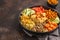 Buddha bowl with vegetables, mushrooms, bulgur, hummus and baked