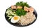 Buddha bowl, wholesome food, boiled rice and salmon, cucumbers and egg, with their seaweed salad