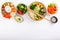 Buddha bowls on white background. Colorful bowls with vegetables, healthy grains, and protein. Healthy vegan food, vegetarian food