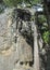 Buddha carved on mountain rock cliff â€œ The large unfinished Buddha image at Dhowa Raja Maha Vihara or The Dhowa rock temple in