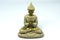 Buddha figure meditating on a white background