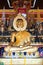 Buddha holding talipot fan at Wat Sang Soc