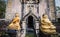 Buddha image in front of the pagoda of Wat Phra Phutthabat Bua Bok Temple that enshrines the legendary Buddha\'s footprint.