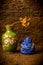 Buddha Lapis Lazuli cloisonne with ornamental vase on shelf