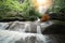 Buddha monk practice meditation at  waterfall