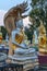 A Buddha with Naga statues at the Buddhist Cemetery.