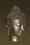 Buddha`s serene face in profile