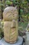 Buddha sculptures in the park of Kamakura. Religious symbols of Japan.