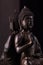 Buddha Shakyamuni`s figure in a pose vitarka mudra.