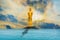 Buddha stands majestically, quietly, there is an evening sky with the sea as the background.