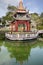 Buddha Statue Altar in Pavilion by the Lake