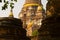 Buddha statue and Ancient architecture in The Wat Yai Chai Mongkhon of Buddhist temple, Ayutthaya, Thailand