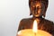 Buddha Statue and Candlelight