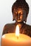 Buddha Statue and Candlelight