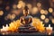 Buddha statue among candles and lotus flowers, blurred background